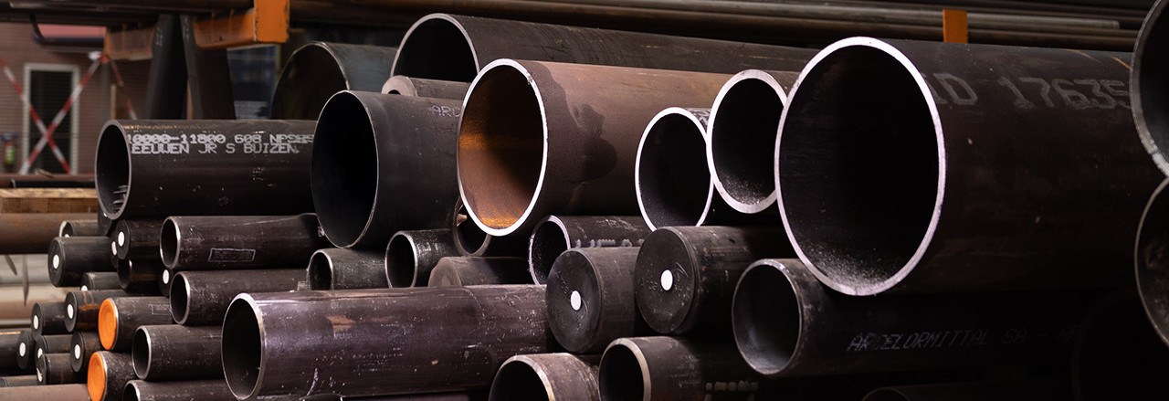 Tupes stacked in shipyard